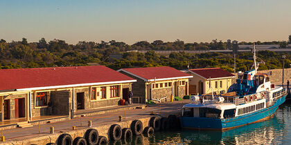 Boat by the quay of Robben Island